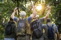 Group of senior adults trekking in the forest