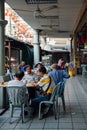Group of senior Chinese man having a breakfast in traditional Ko