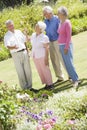 Group of senior friends in garden Royalty Free Stock Photo