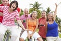 Group Of Senior Friends Having Fun On Bicycle Ride Royalty Free Stock Photo