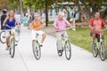 Group Of Senior Friends Having Fun On Bicycle Ride Royalty Free Stock Photo