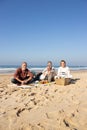 Group of senior friends having picnic at the beach Royalty Free Stock Photo