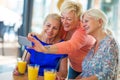 Group of senior friends taking a selfie Royalty Free Stock Photo