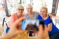 Group of senior friends taking a selfie Royalty Free Stock Photo