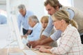 Group of seniors attending computing class Royalty Free Stock Photo