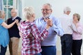 Group Of Seniors Enjoying Dancing Club Together Royalty Free Stock Photo