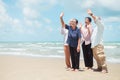 Group of seniors playing together on vacation Dye and be happy during retirement Royalty Free Stock Photo