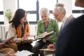 Group of seniors with singing books together at choir rehearsal. Royalty Free Stock Photo