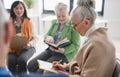 Group of seniors with singing books together at choir rehearsal. Royalty Free Stock Photo