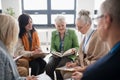 Group of seniors with singing books together at choir rehearsal. Royalty Free Stock Photo