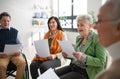 Group of seniors with singing together at choir rehearsal. Royalty Free Stock Photo