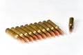 Group several rifle cartridges with reflections