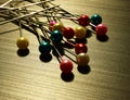 Sewing pins with different color heads Royalty Free Stock Photo