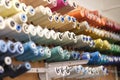 group of sewing threads in skeins. A bunch of large multicolored spools of thread. Atelier workshop. A set of colored Royalty Free Stock Photo