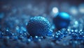 a group of shiny blue balls on a dark surface with a blurry background. Royalty Free Stock Photo