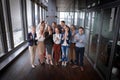 Group shot of business people in modern office hall