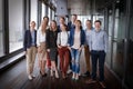 Group shot of business people in modern office hall