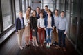 Group shot of business people in modern office hall