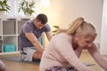 Group Sitting On Exercise Mats Stretching In Yoga Class Inside Community Center Royalty Free Stock Photo