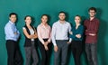 Group of six businesspeople colleague in modern company standing together. The idea for team work in a business office Royalty Free Stock Photo