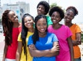 Group of six laughing african american woman in colorful shirts