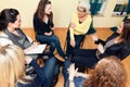 Group Of Women Sitting In A Circle, Discussing