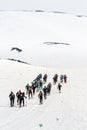 Group ski mountaineers climb on skis on Avacha Volcano. Team Race ski mountaineering. Russia, Kamchatka