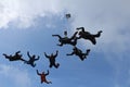 A group of skydivers. Skydiving is in the sky. Royalty Free Stock Photo