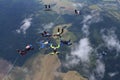 A group of skydivers. Skydiving is in the sky. Royalty Free Stock Photo