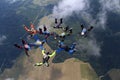 A group of skydivers. Skydiving is in the sky. Royalty Free Stock Photo