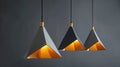 a group of sleek, modern pendant lights featuring geometric lampshades, suspended gracefully from regular electric