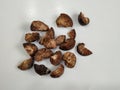 Group of Slice Dried Betel Areca nut. Dried betel nut (Areca catechu) is the fruit of the areca palm Royalty Free Stock Photo