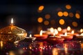 A group of small decorated burning candles on a dark background with a bokech effect. Diwali, the dipawali Indian festival of Royalty Free Stock Photo