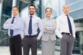 Group of smiling businessmen outdoors Royalty Free Stock Photo