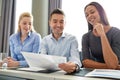 Group of smiling businesspeople meeting in office Royalty Free Stock Photo