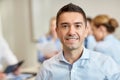 Group of smiling businesspeople meeting in office Royalty Free Stock Photo