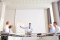 Group of smiling businesspeople meeting in office Royalty Free Stock Photo