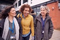 Group Of Smiling Female Mature Students Walking Outside College Building Royalty Free Stock Photo