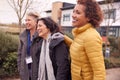 Group Of Smiling Female Mature Students Walking Outside College Building Royalty Free Stock Photo