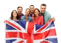 Group of smiling friends with british flag