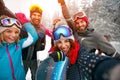 Group of smiling friends with ski on winter holidays - Skiers ha Royalty Free Stock Photo