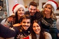 Group of friends with sparklers enjoying in party on Christmas d Royalty Free Stock Photo