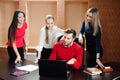 Group of smiling inspired young business people working together Royalty Free Stock Photo