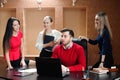 Group of smiling inspired young business people working together Royalty Free Stock Photo