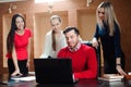 Group of smiling inspired young business people working together Royalty Free Stock Photo