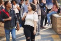 Group Of Smiling Male And Female College Students Walking And Chatting Outside School Building Royalty Free Stock Photo