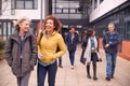 Group Of Smiling Mature Students Walking Outside College Building Royalty Free Stock Photo