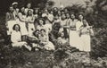 Group of smiling people in the countryside in 50s 2