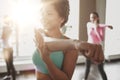 Group of smiling people dancing in gym or studio Royalty Free Stock Photo