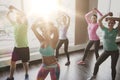 Group of smiling people dancing in gym or studio Royalty Free Stock Photo